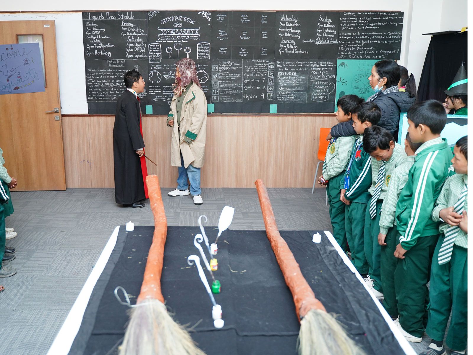 Students at Imperial World School conducting a science experiment, engaging in hands-on learning.