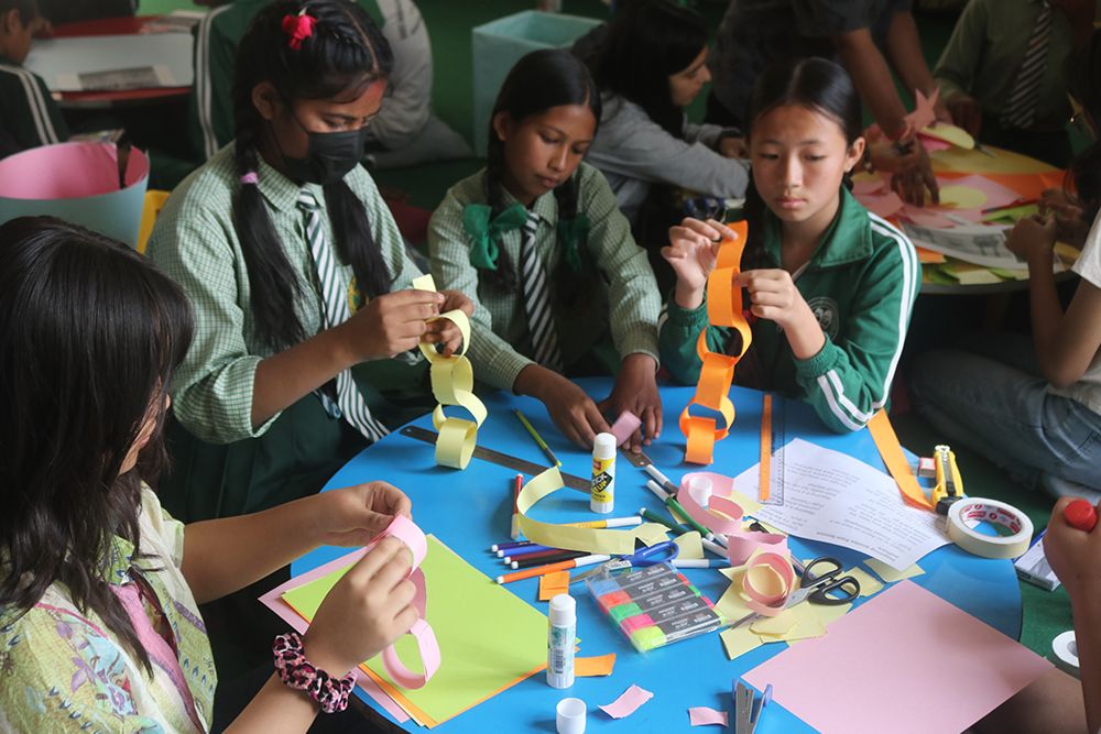 Grade 9–10 students from Imperial World School join CSR activities at Madan Ashrit Adarsha School on 03 May 2024.
