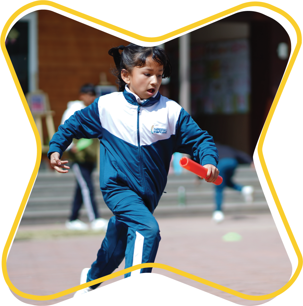 A student at Imperial World School playing relay on an outdoor court, showcasing the school's sports programs.