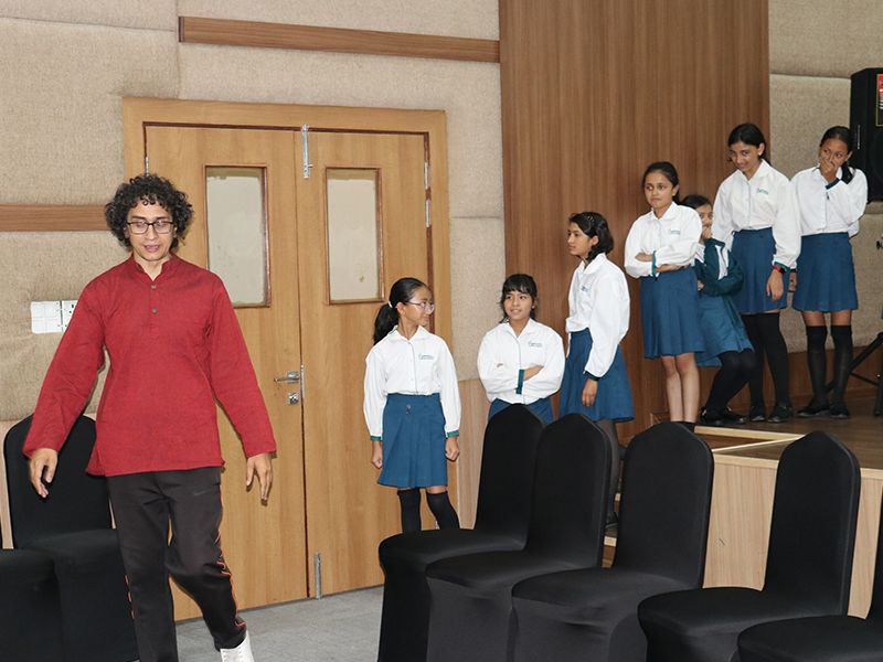 Tanka Chaulagain orients Grades 1-10 at Imperial World School, Kathmandu, on theater program, 19 June 2024, for drama performances.