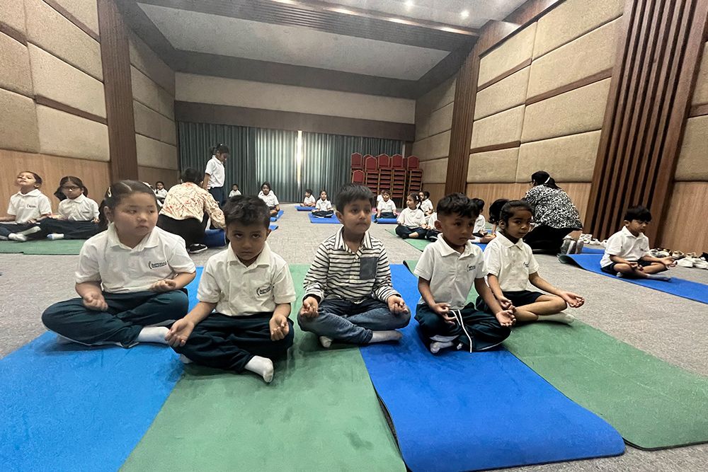 Students from Grades 1–8 join yoga, sound healing, and Child Safe Net session at IWS on Zero Week Day 5, 03 May 2024.