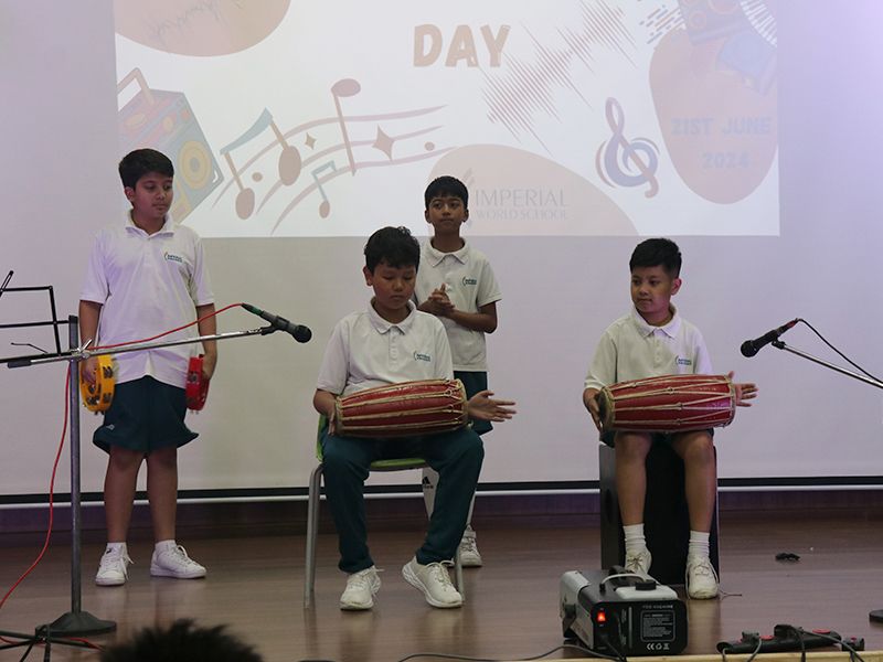 Hercules Basnyet performs at Imperial World School, Kathmandu, on World Music Day, 21 June 2024, with students showcasing musical talents.